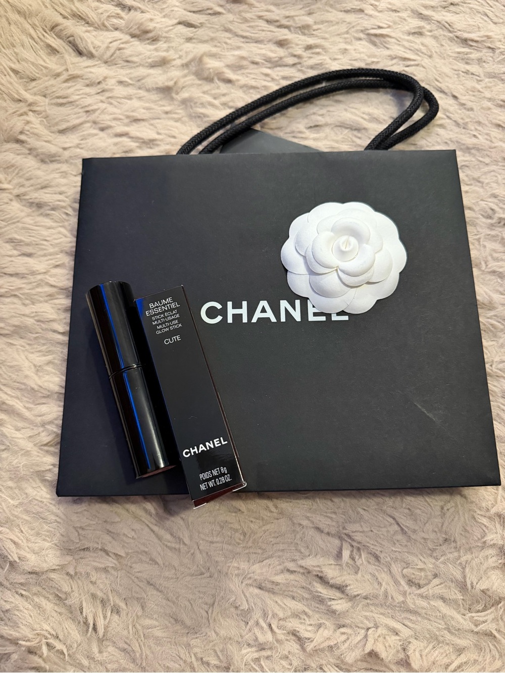 CHANEL ROUGE NOIR COLLECTION The Baume Essentiel, a multi-use stick, in Cute
